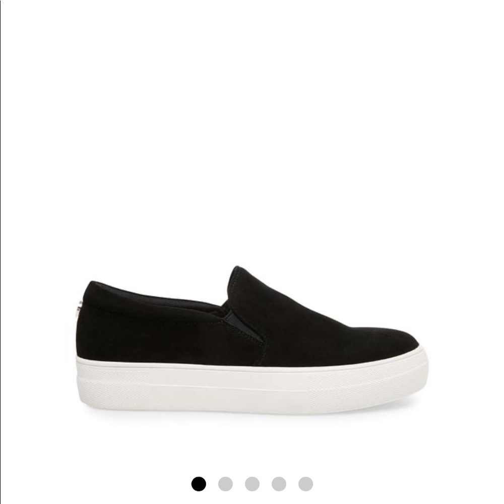 Black and white slip on shoes